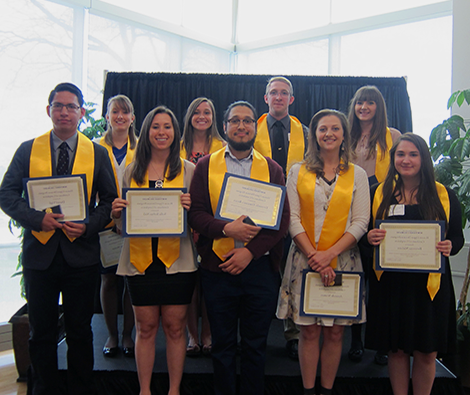 Upper Division Honors Graduates holding certificates